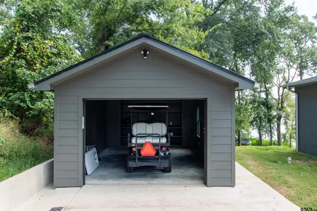a view of car parked in the yard