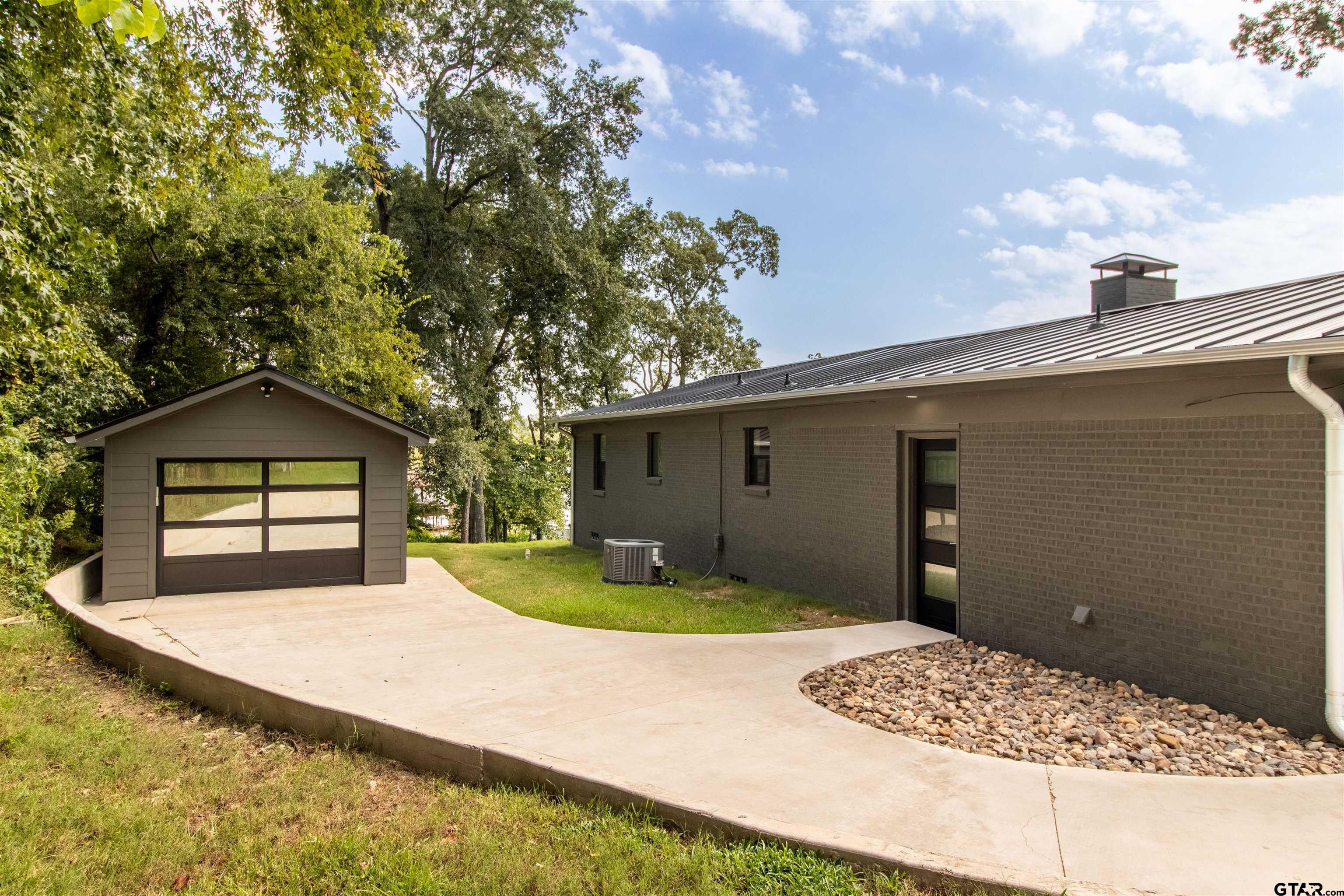15807 North Peninsula Road Whitehouse, TX 75791 - Photo 32 of 44 a house view with a outdoor space