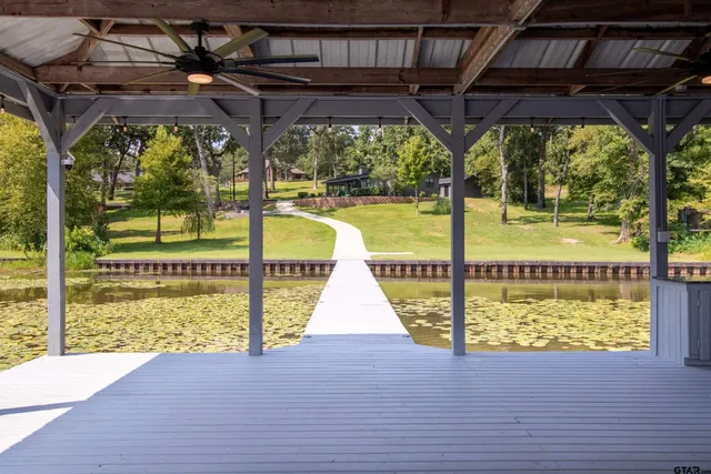 a view of swimming pool from a balcony