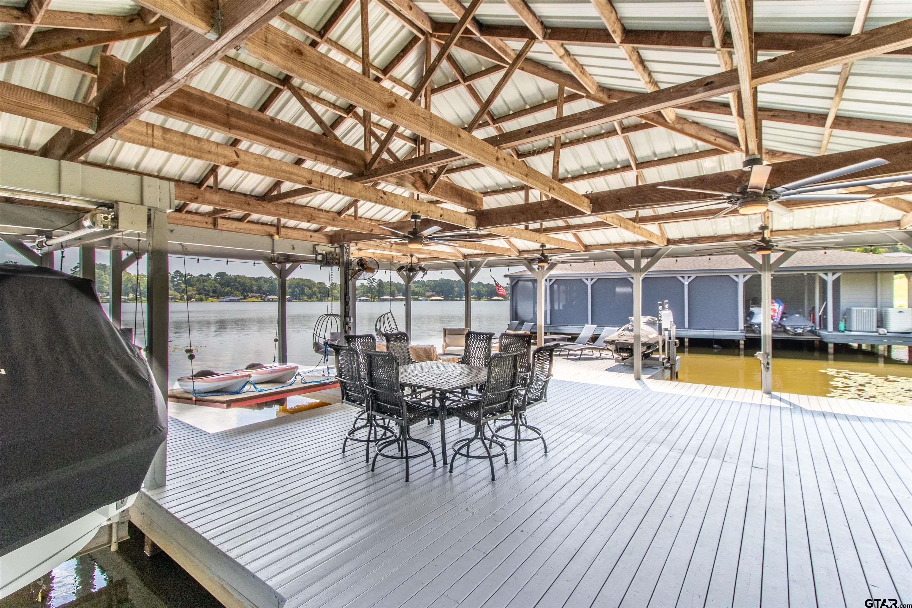 15807 North Peninsula Road Whitehouse, TX 75791 - Photo 37 of 44 a view of a swimming pool with a patio