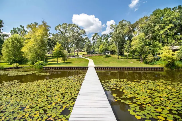 a picture of a bathroom with a shower