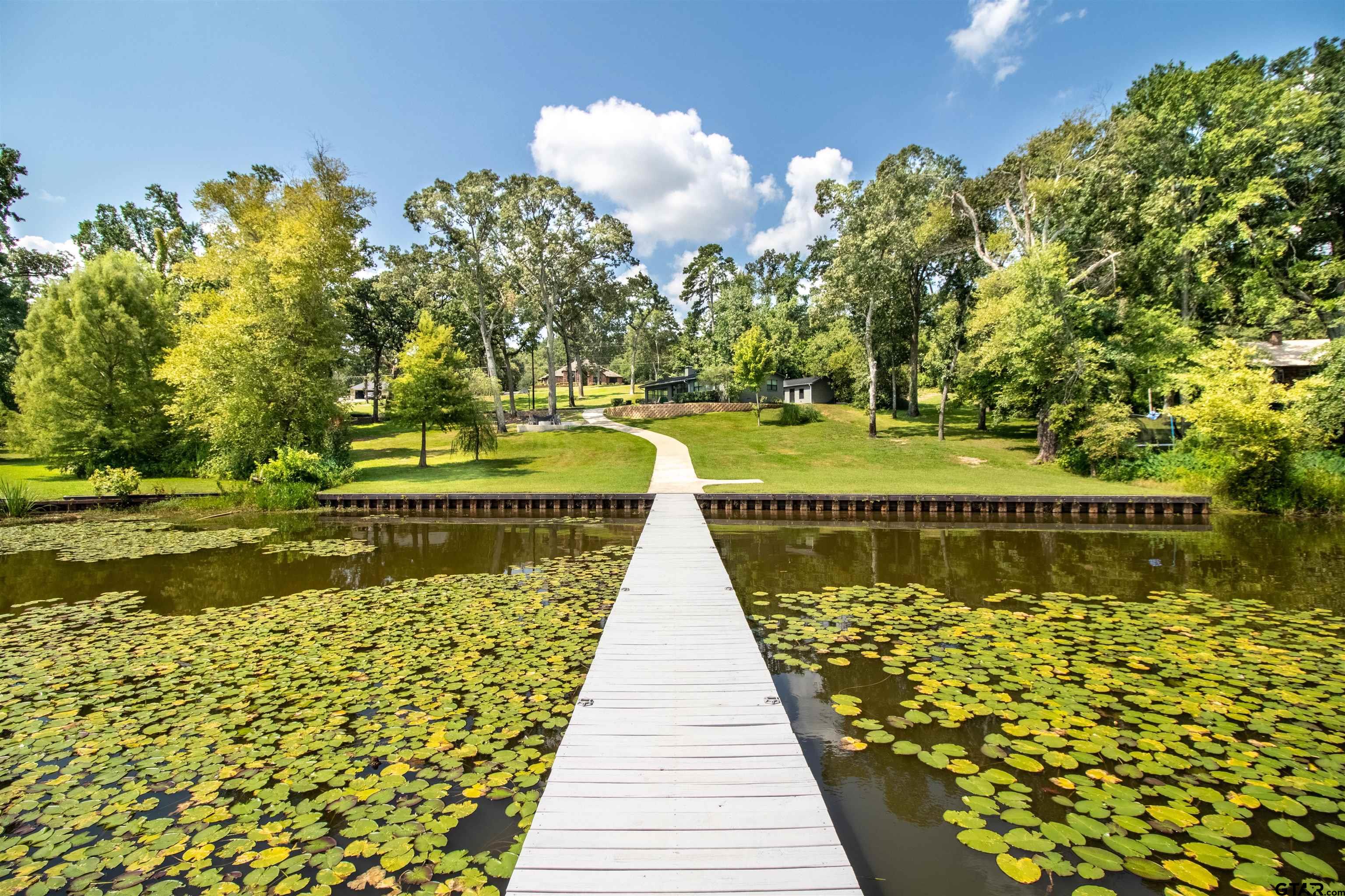 15807 North Peninsula Road Whitehouse, TX 75791 - Photo 43 of 44 a view of a wooden floor and lake