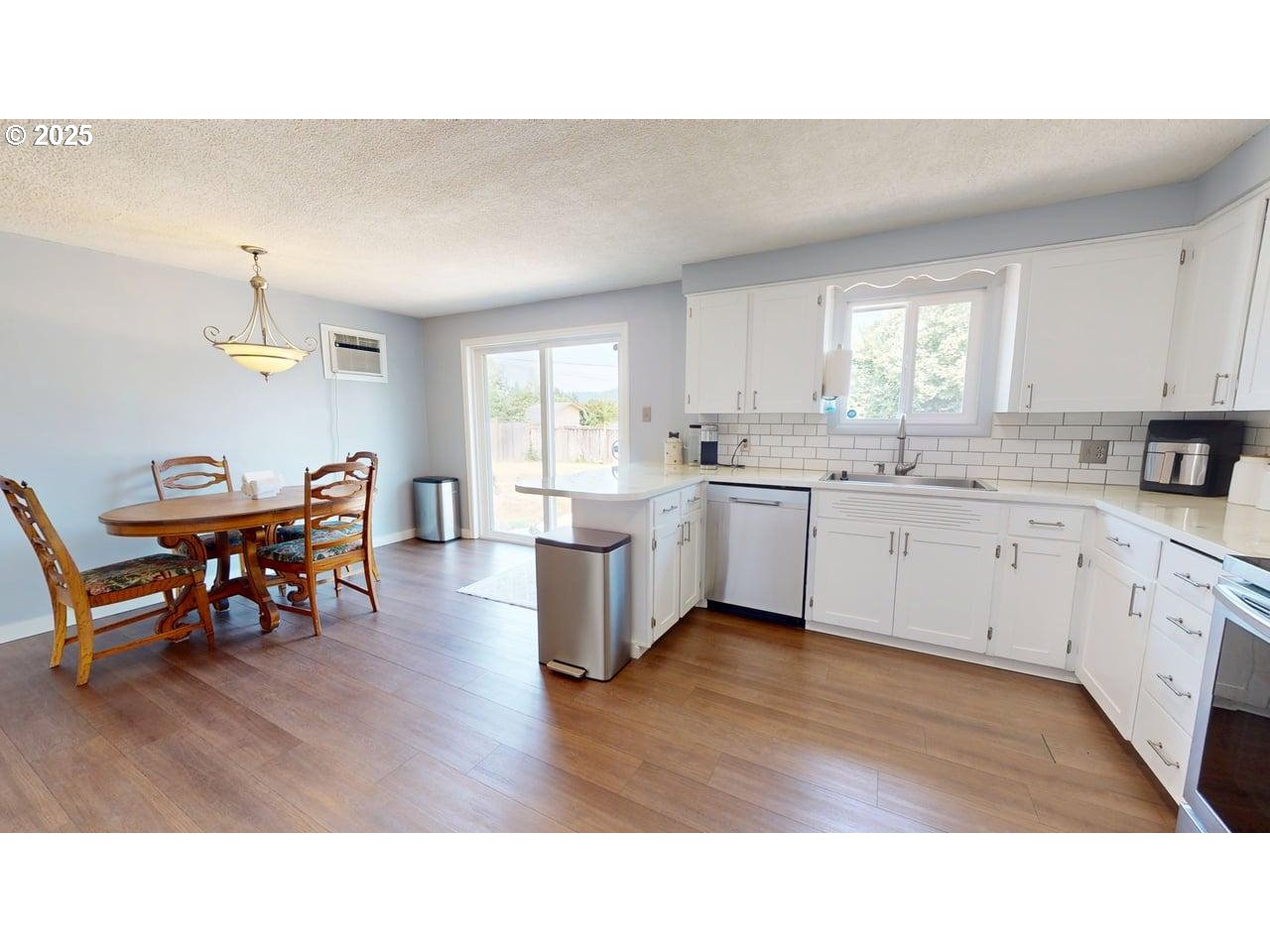 2130 Yolanda Avenue Springfield, OR 97477 - Photo 21 of 30 a open kitchen with sink and cabinets