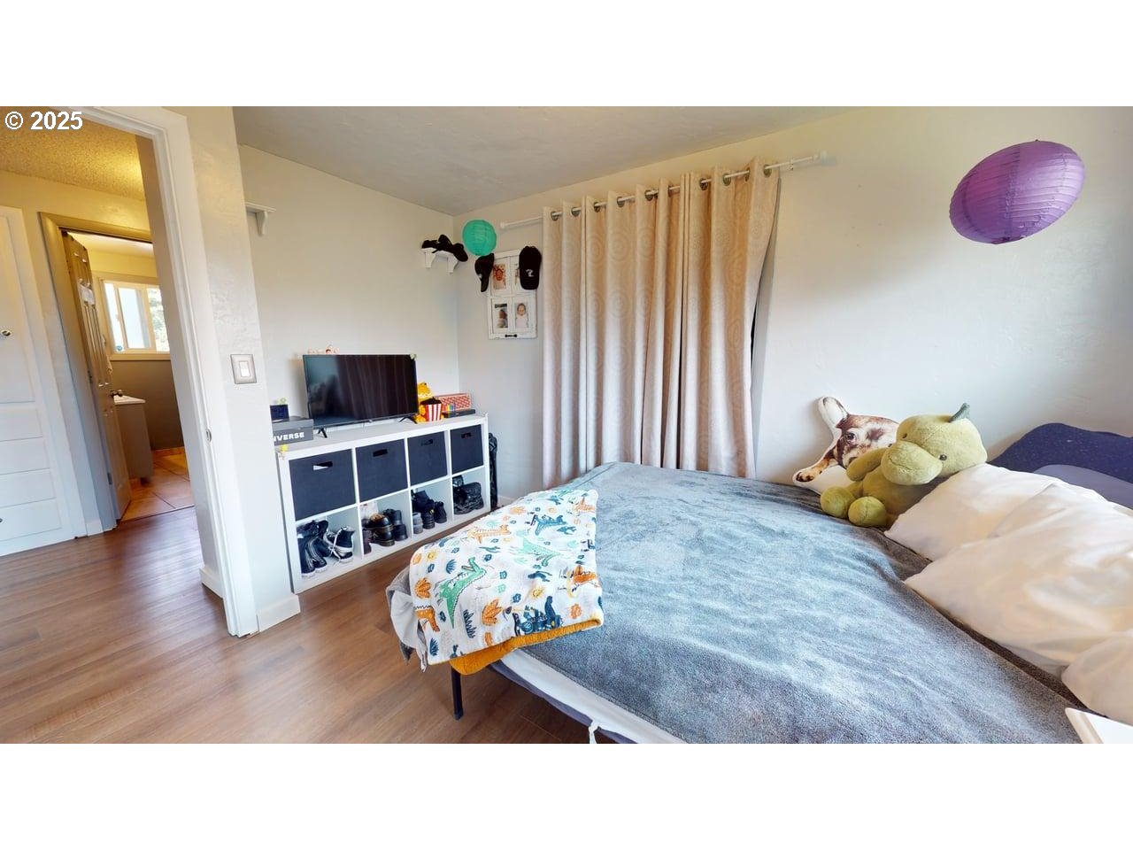 2130 Yolanda Avenue Springfield, OR 97477 - Photo 26 of 30 a bedroom with a bed and wooden floor