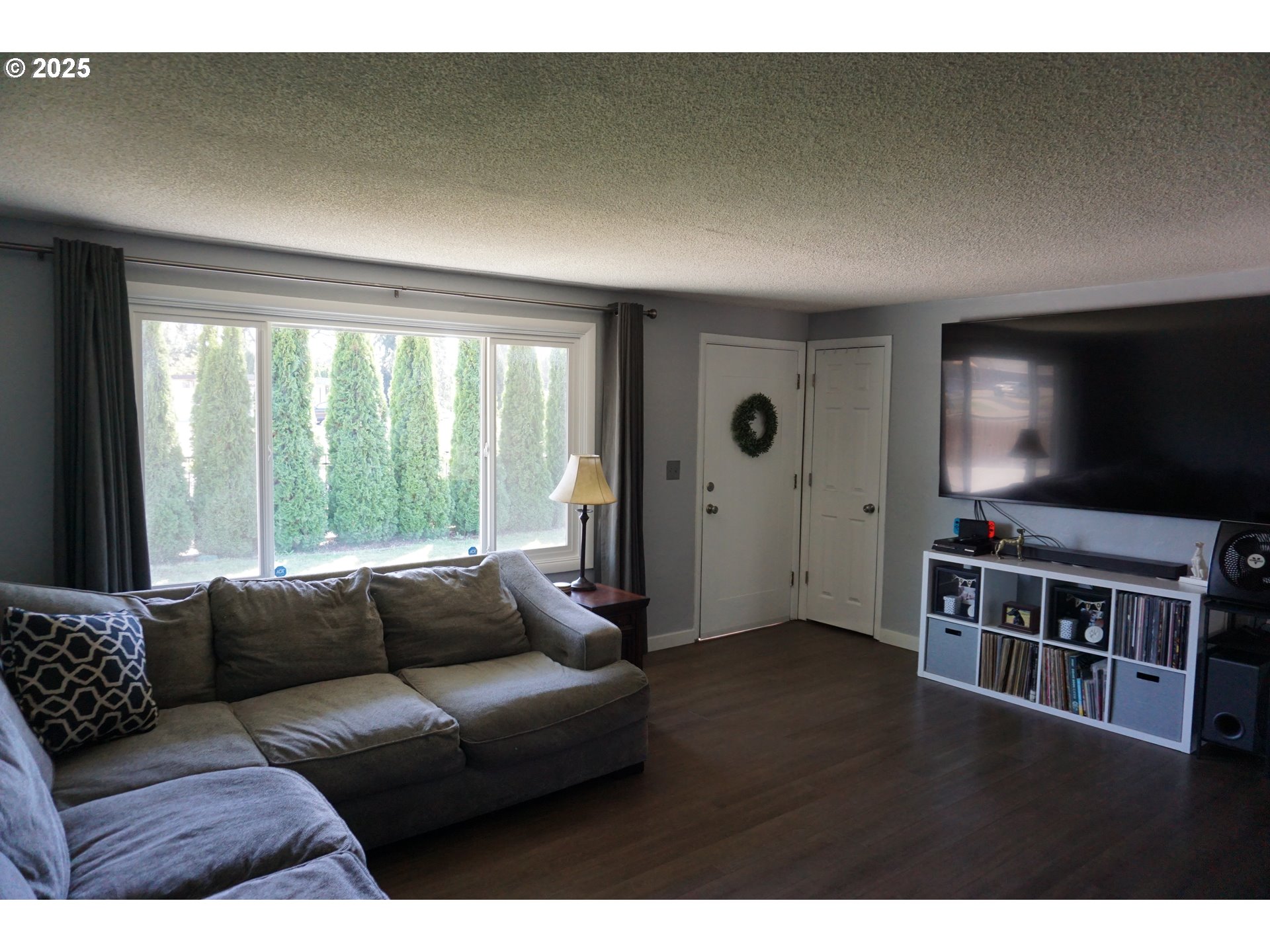 2130 Yolanda Avenue Springfield, OR 97477 - Photo 4 of 30 a living room with furniture and a flat screen tv
