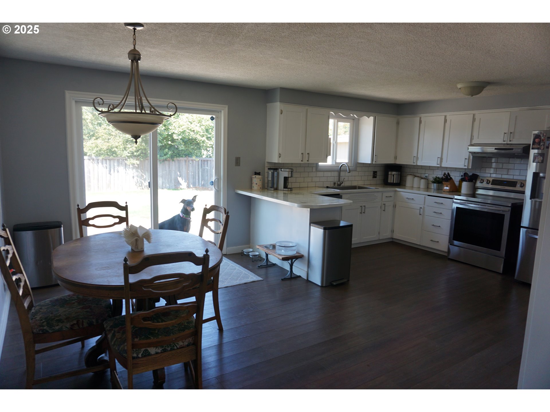 2130 Yolanda Avenue Springfield, OR 97477 - Photo 8 of 30 a kitchen with sink and wooden floor
