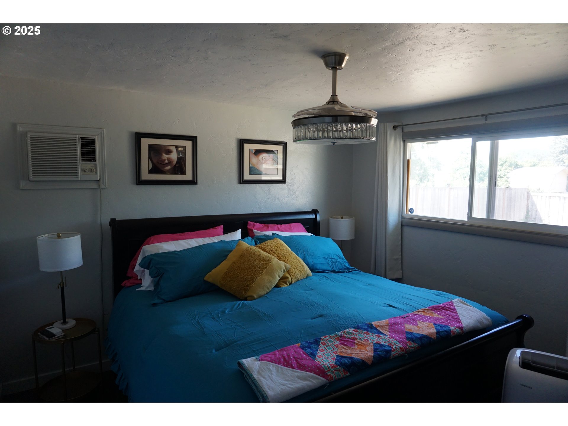 2130 Yolanda Avenue Springfield, OR 97477 - Photo 10 of 30 a bedroom with a bed and a window