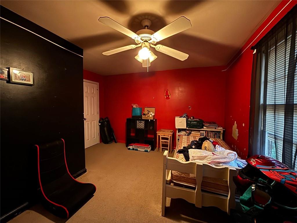 4926 Maroney Mill Road Douglasville, GA 30134 - Photo 18 of 26 a view of a room with gym equipment