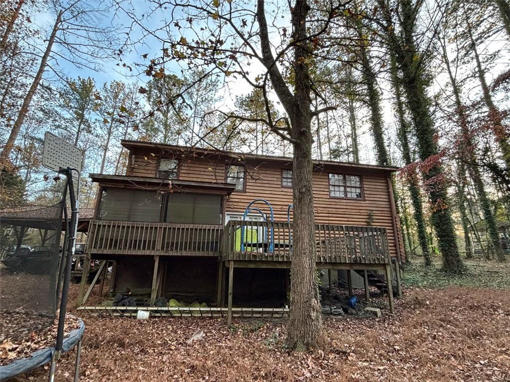 4926 Maroney Mill Road Douglasville, GA 30134 - Photo 2 of 26 a view of a house with a fence and a tree