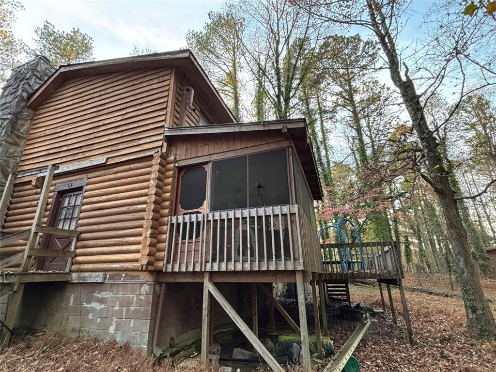 4926 Maroney Mill Road Douglasville, GA 30134 - Photo 22 of 26 a view of a house with a roof deck