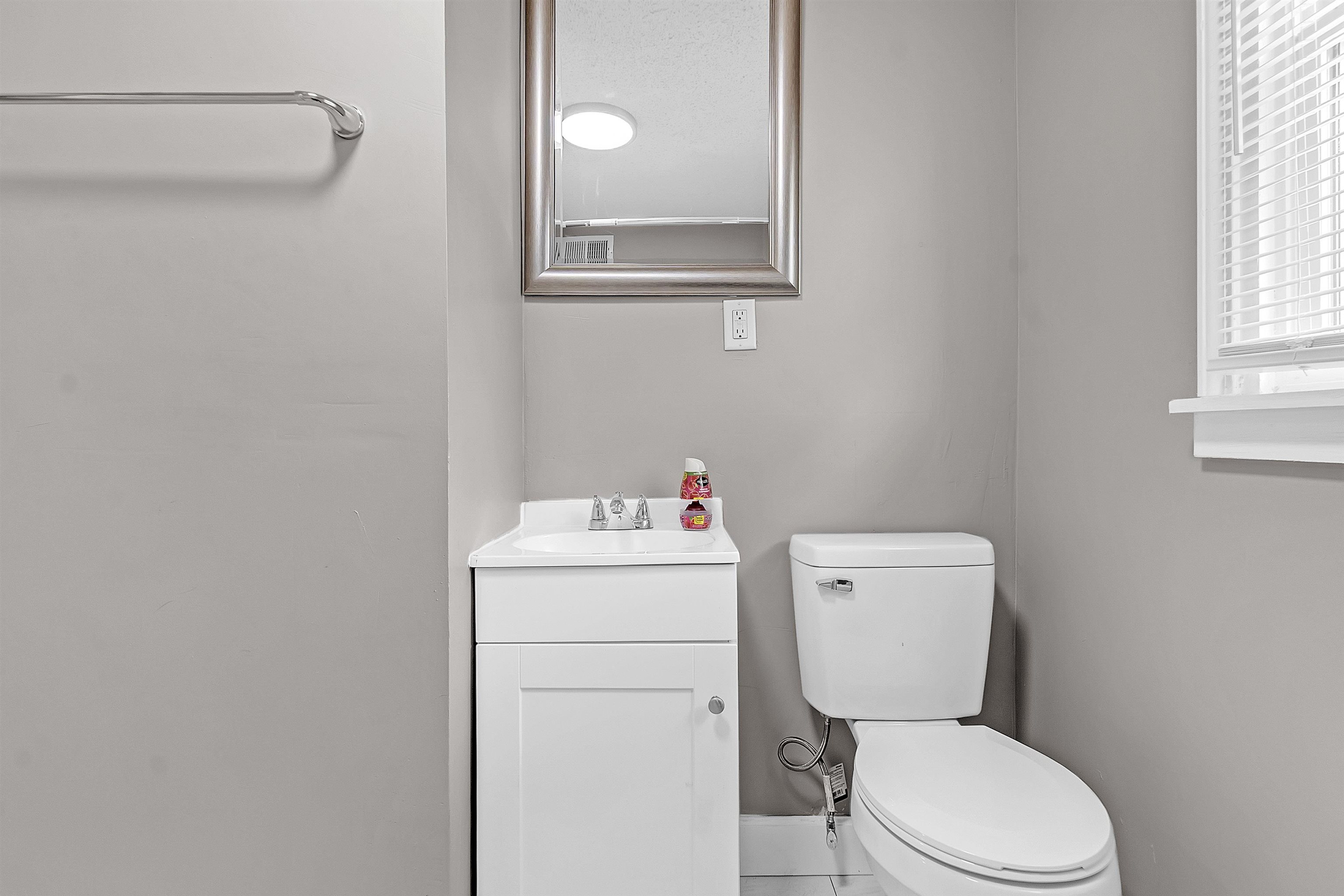 1526 Railton Road Memphis, TN 38111 - Photo 18 of 22 Half bath with vanity and toilet