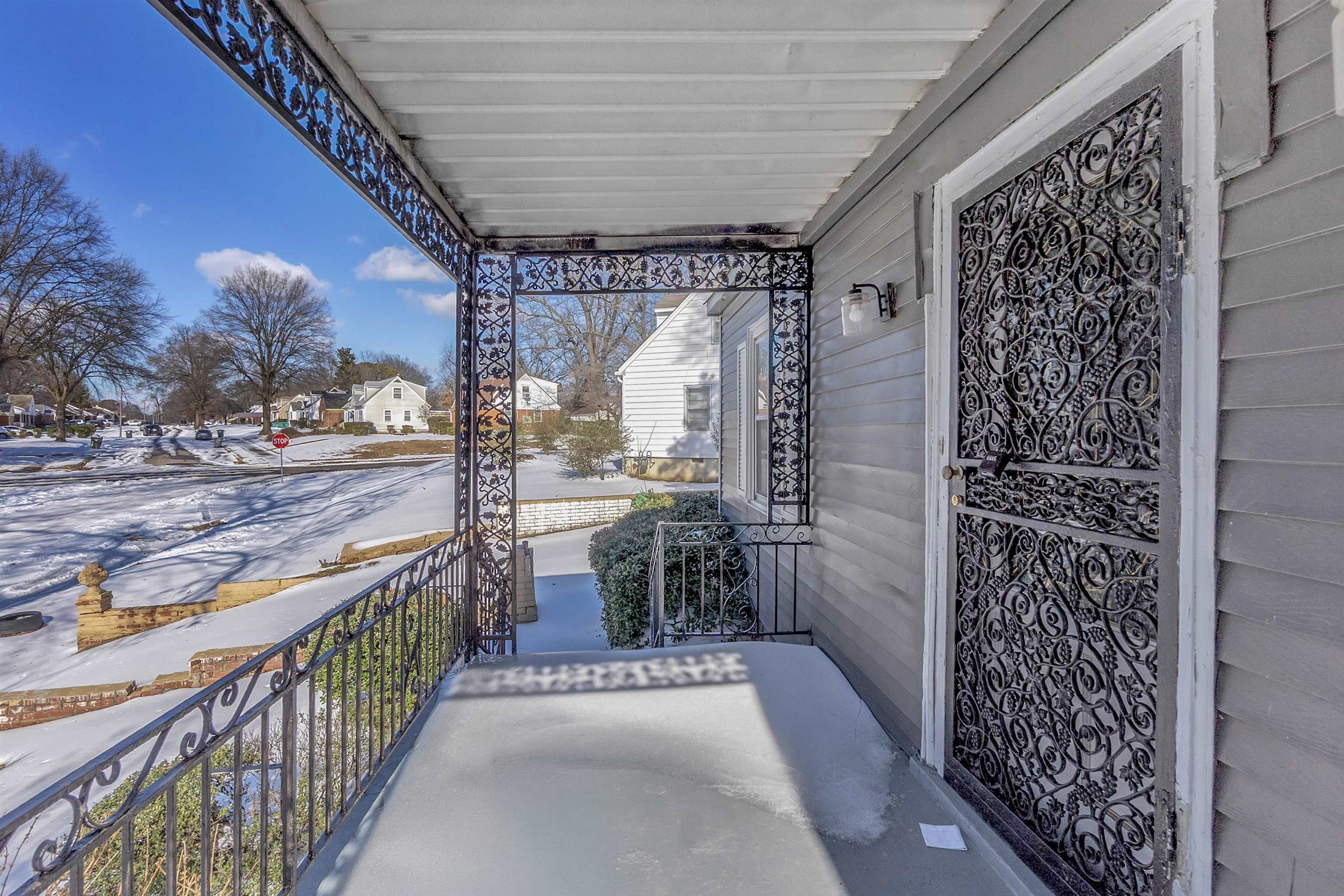1526 Railton Road Memphis, TN 38111 - Photo 4 of 22 Covered porch featuring a residential view and a sunroom