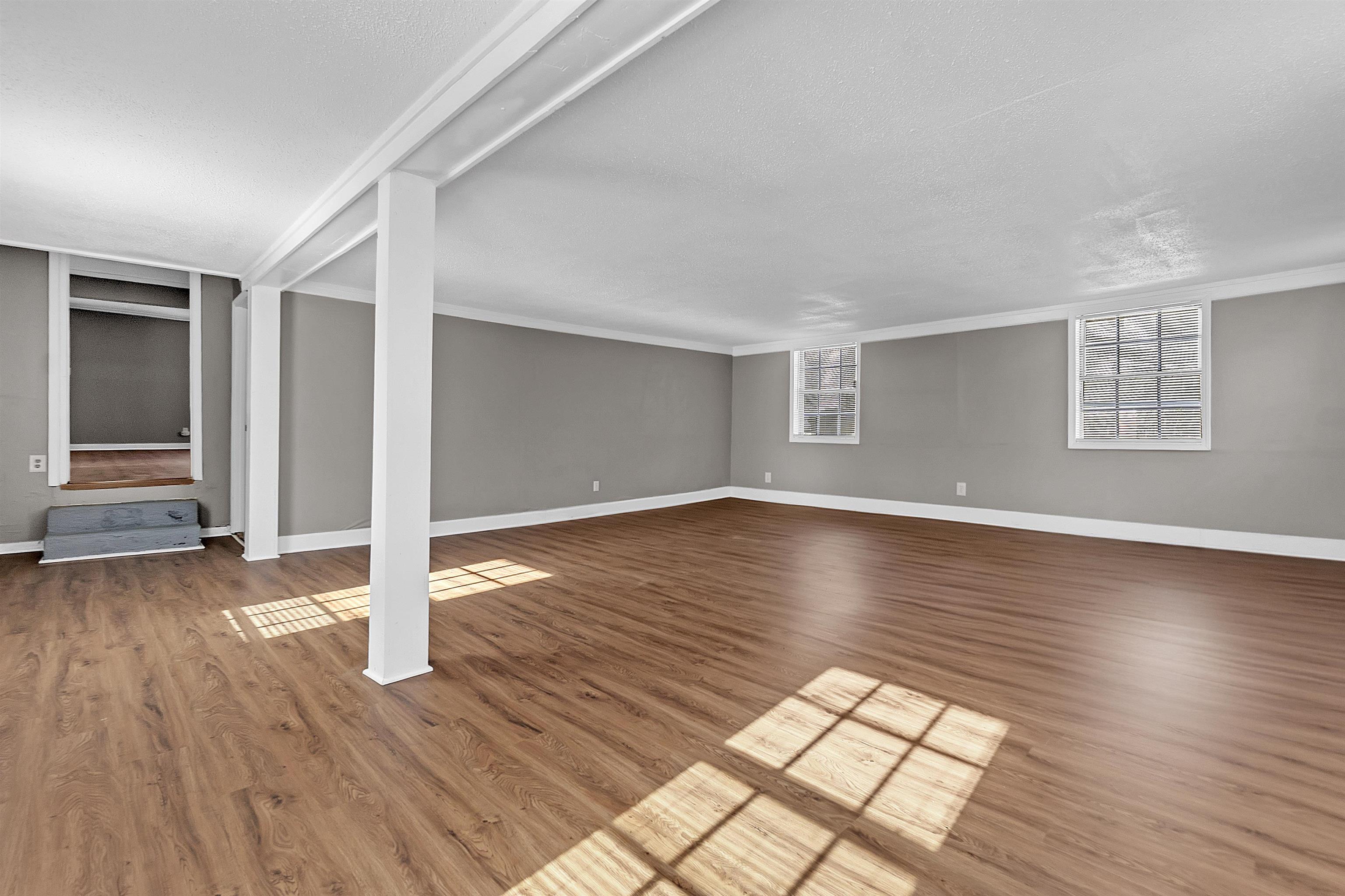 1526 Railton Road Memphis, TN 38111 - Photo 6 of 22 Below grade area featuring wood finished floors and ornamental molding