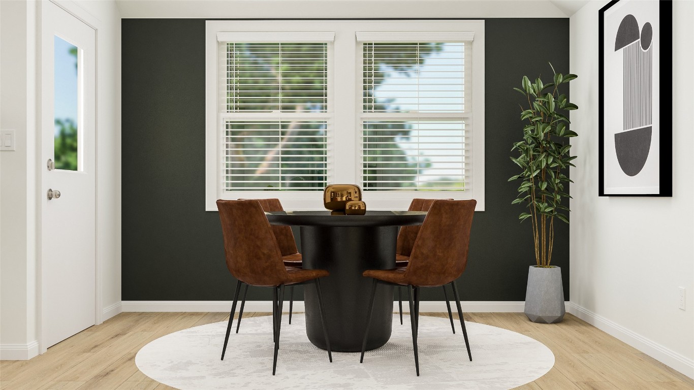 163 Avre Loop Kyle, TX 78640 - Photo 2 of 9 a table and chairs in a room