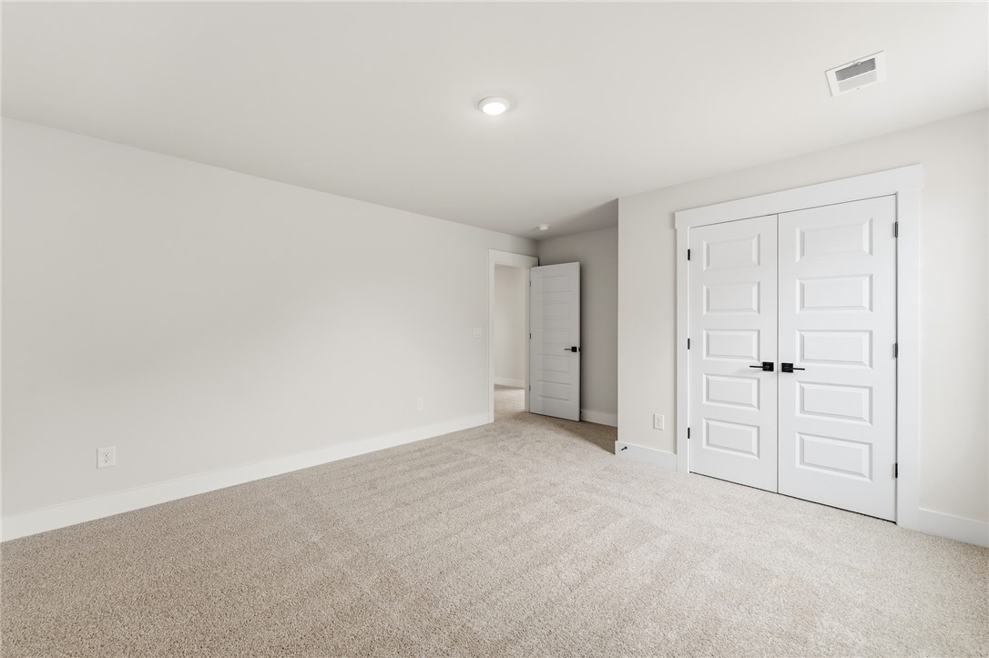319 Summerall Drive Anderson, SC 29621 - Photo 31 of 37 This bright and airy room offers soft carpeting, crisp white walls, and elegant double doors.