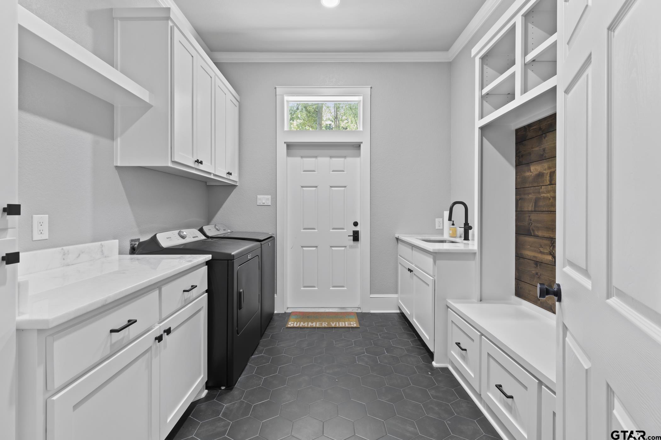 18630 Eastside Road Troup, TX 75789 - Photo 20 of 47 a kitchen with cabinets a sink and appliances