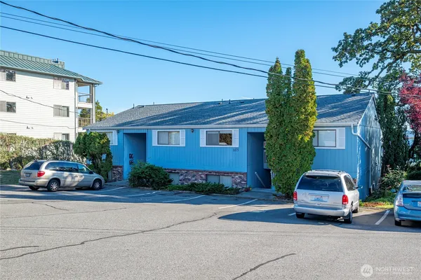 a car parked in front of a house