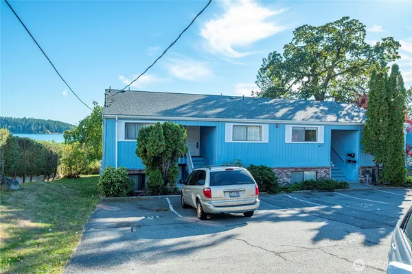 a car parked in front of a house