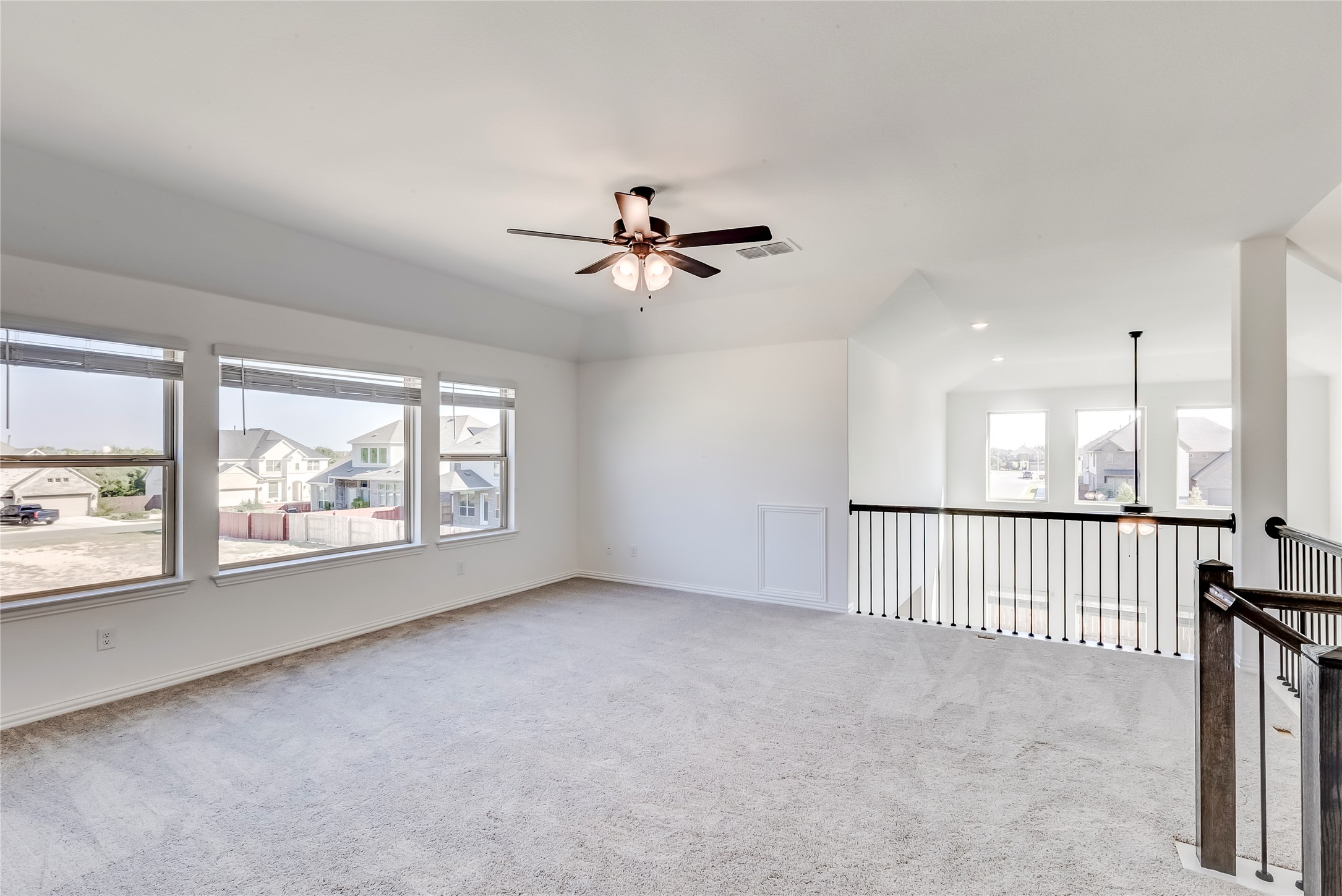 920 Old Gdn Road Leander, TX 78641 - Photo 25 of 39 Spare room featuring light colored carpet and a ceiling fan