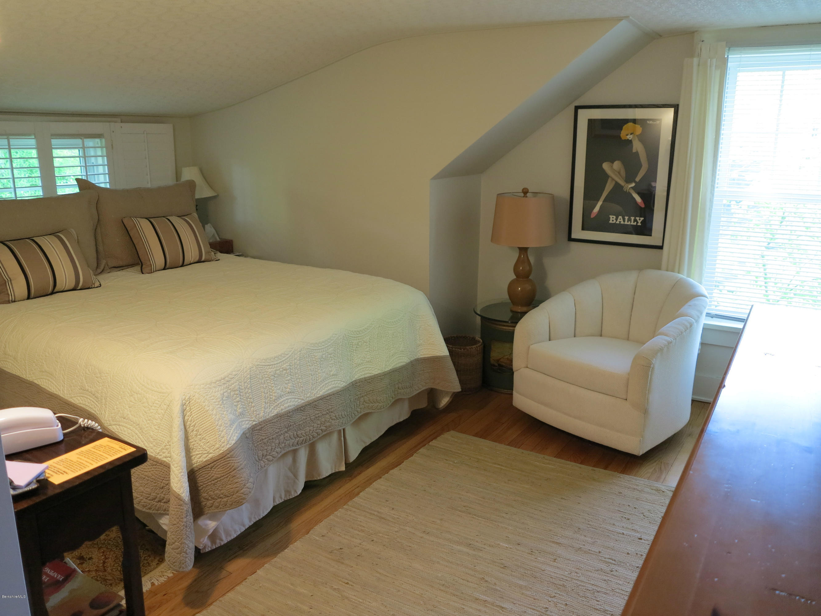 4 Tyringham Road Monterey, MA 01245 - Photo 11 of 26 a bedroom with a bed and couch