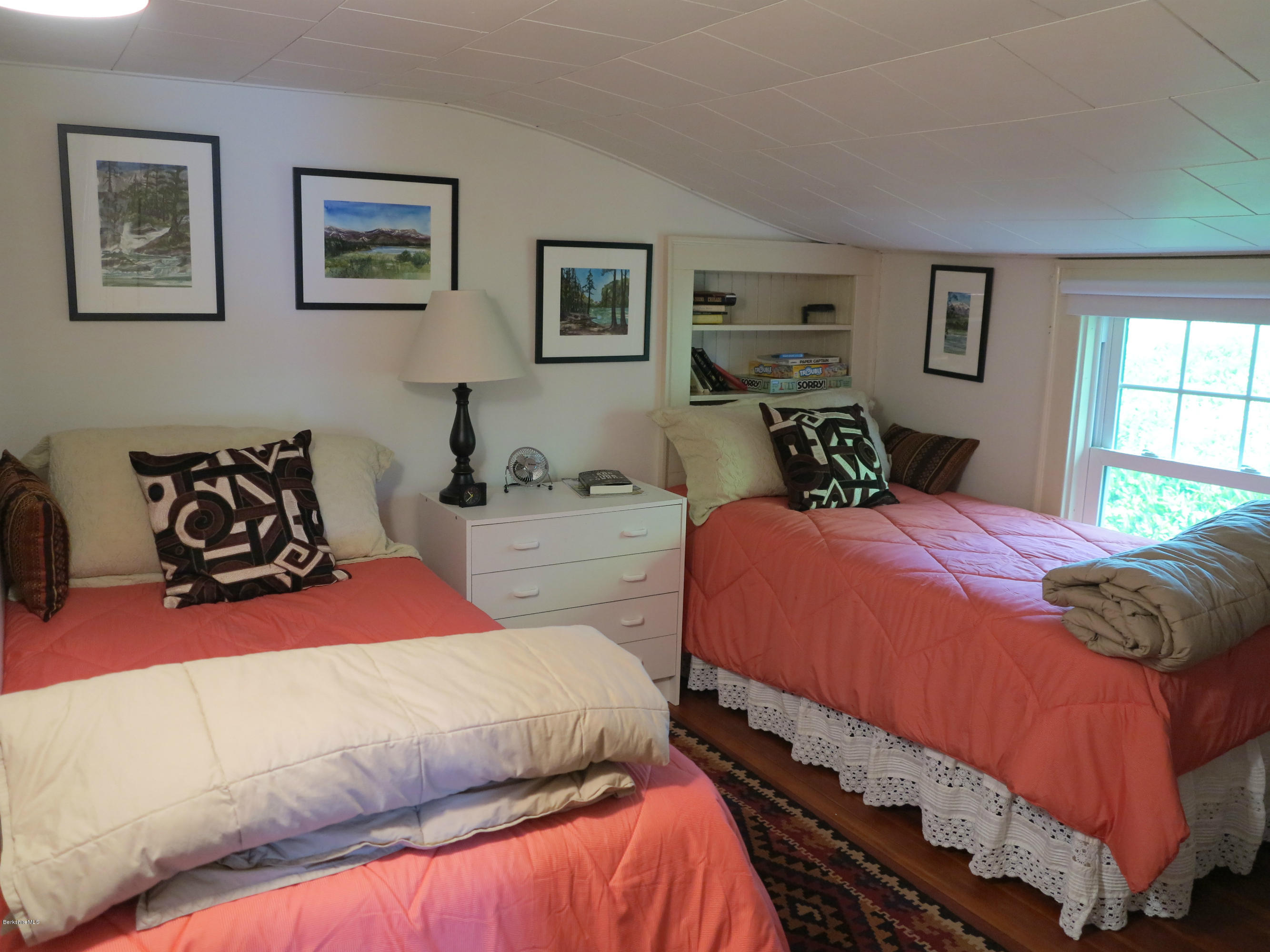 4 Tyringham Road Monterey, MA 01245 - Photo 12 of 26 a bedroom with beds and painting on the wall