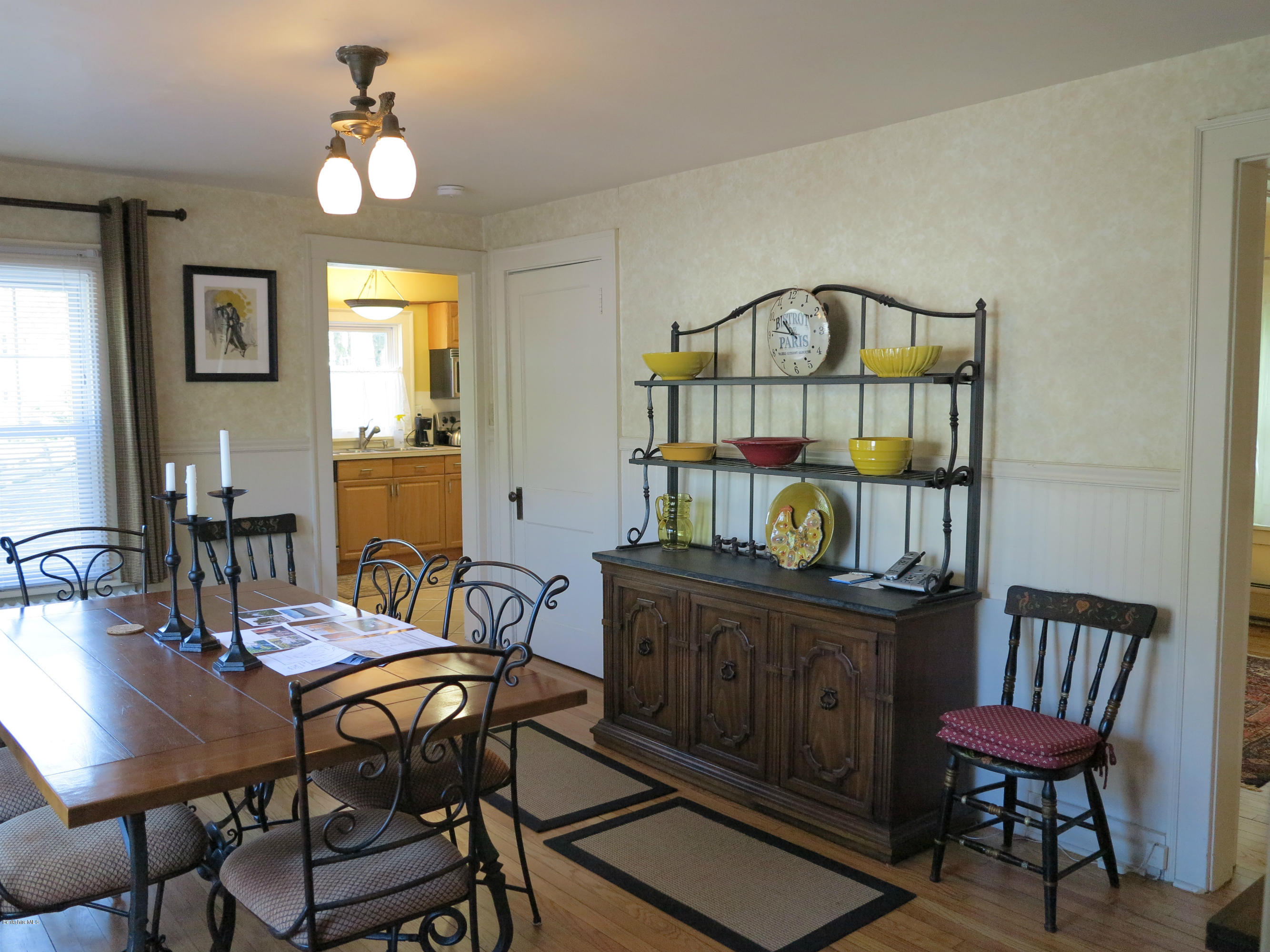4 Tyringham Road Monterey, MA 01245 - Photo 24 of 26 a view of a a dining room with furniture window and wooden floor