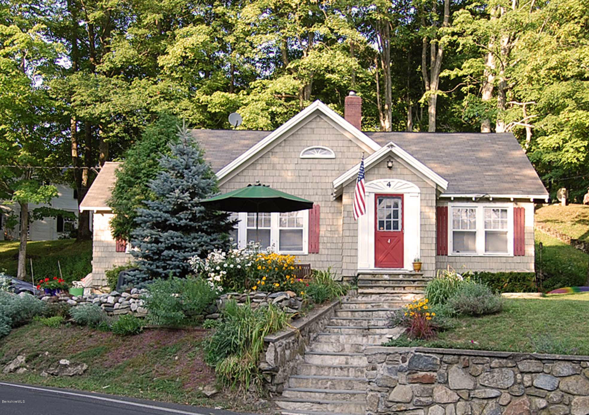4 Tyringham Road Monterey, MA 01245 - Photo 26 of 26 a front view of a house with garden