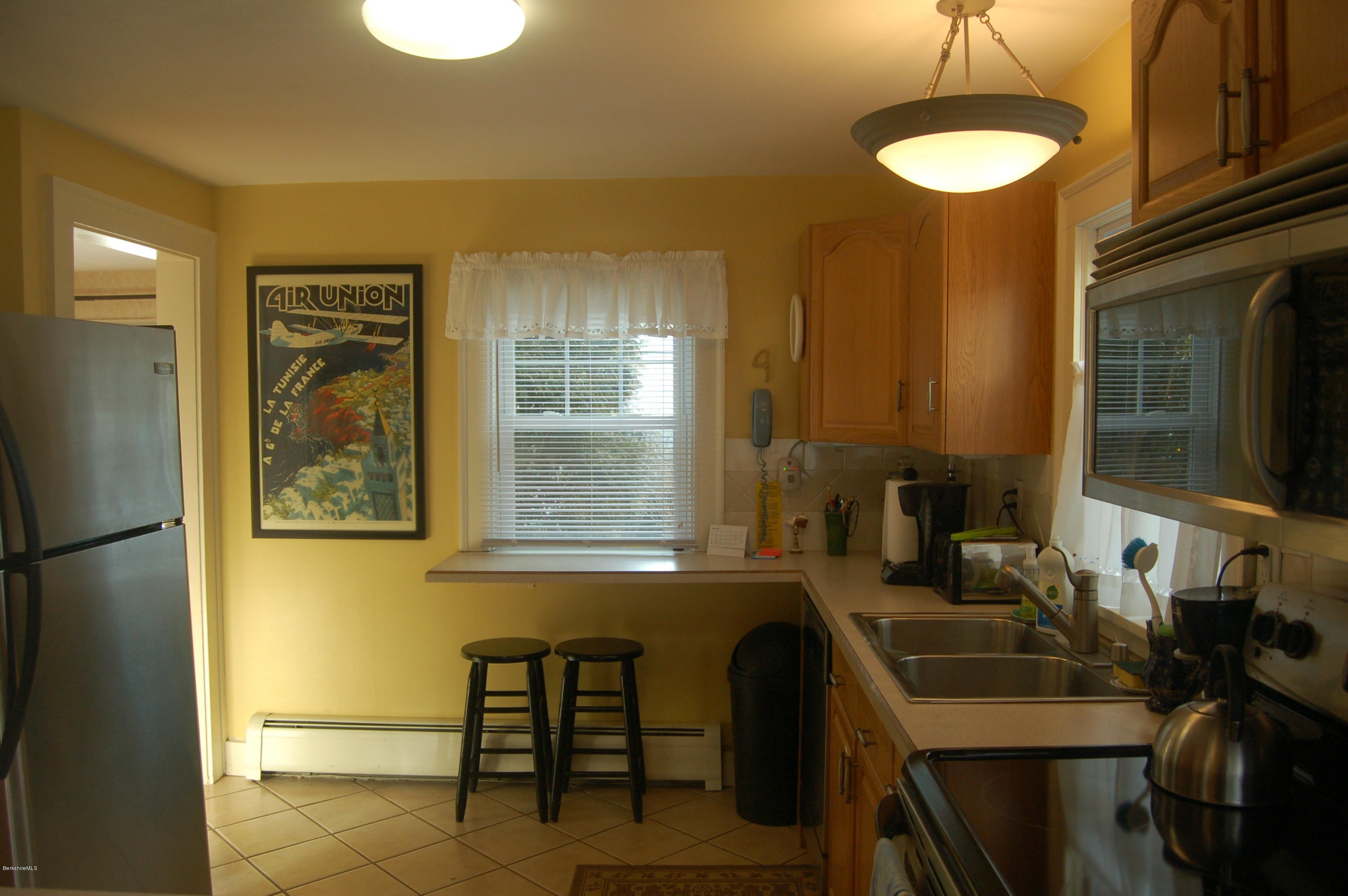 4 Tyringham Road Monterey, MA 01245 - Photo 8 of 26 a bathroom with a sink and a mirror