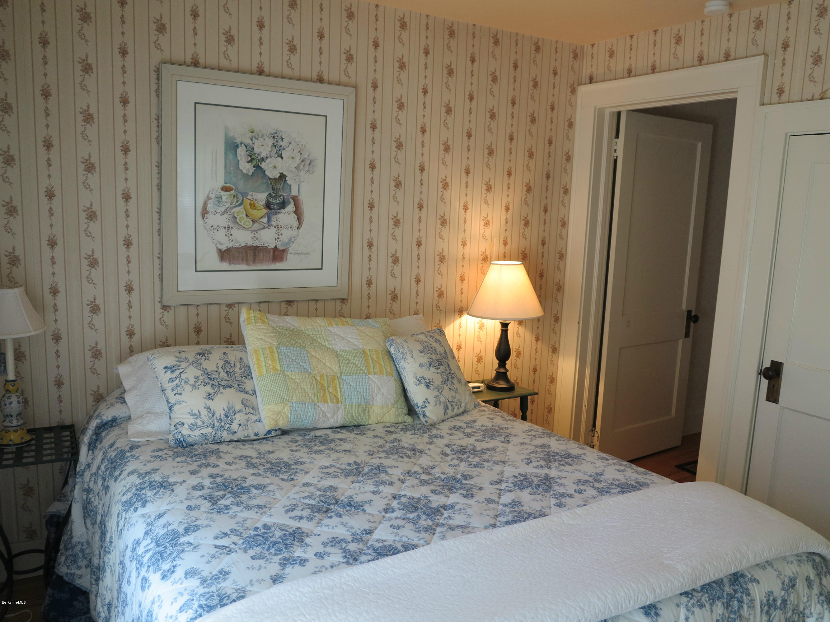 4 Tyringham Road Monterey, MA 01245 - Photo 10 of 26 a bedroom with a bed and a painting on the wall