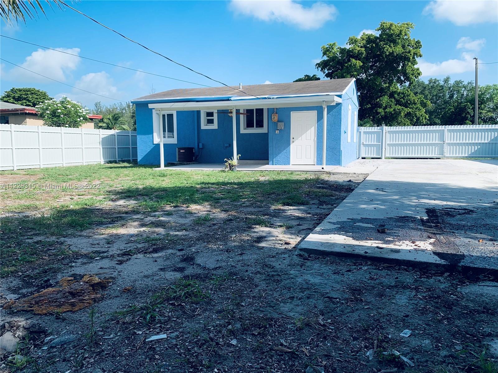 1315 Northwest 86th Street Miami, FL 33147 - Photo 10 of 16 a view of outdoor space yard and deck