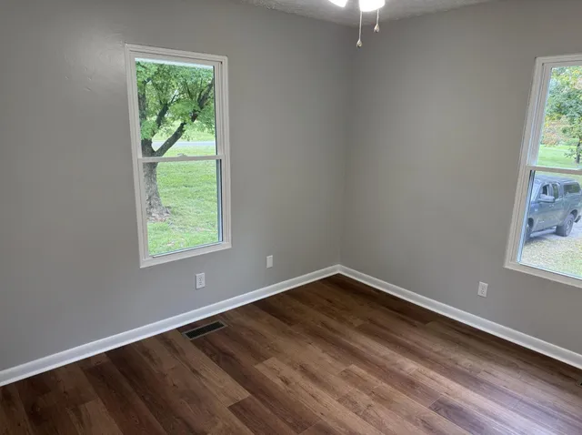 an empty room with window