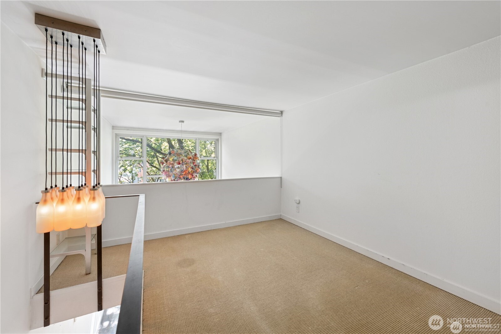 1000 Union Street, Unit 402 Seattle, WA 98101 - Photo 5 of 10 an empty room with windows