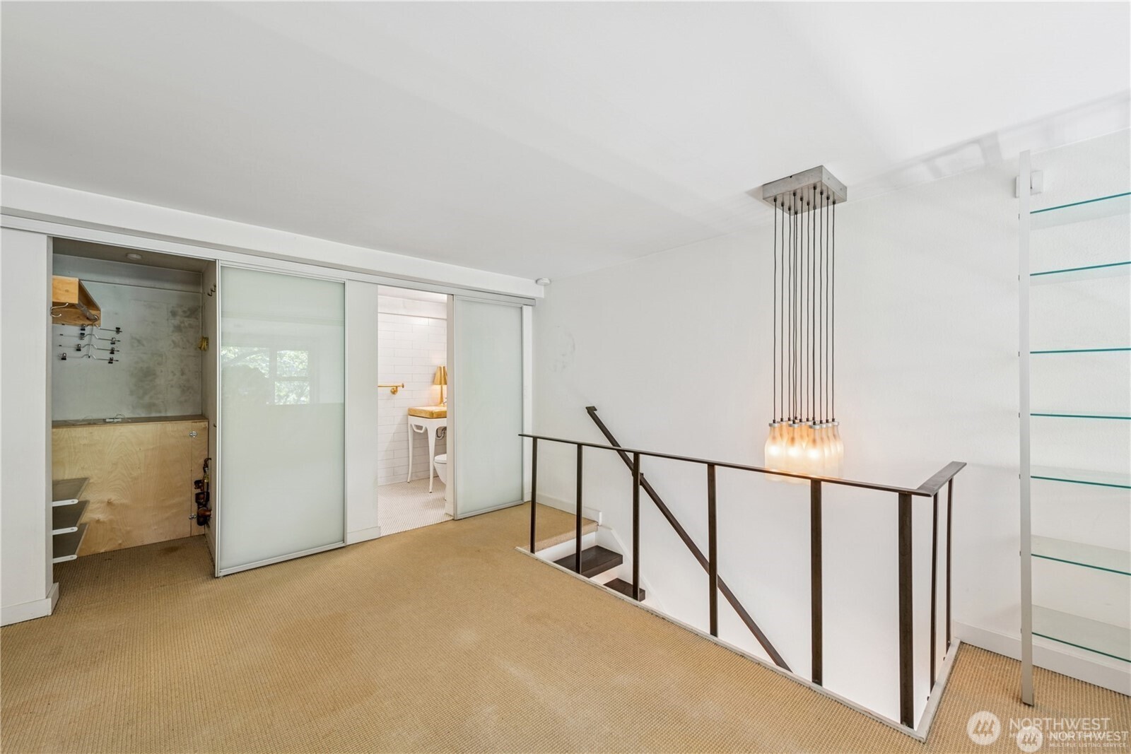 1000 Union Street, Unit 402 Seattle, WA 98101 - Photo 6 of 10 a view of hallway with stairs