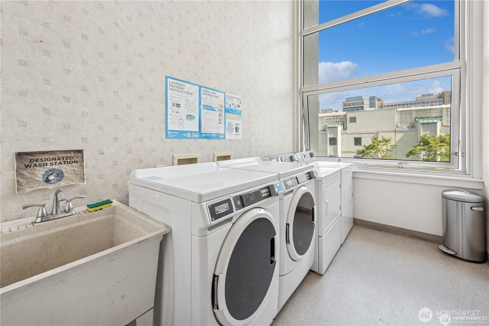 1000 Union Street, Unit 402 Seattle, WA 98101 - Photo 9 of 10 a utility room with dryer and washer