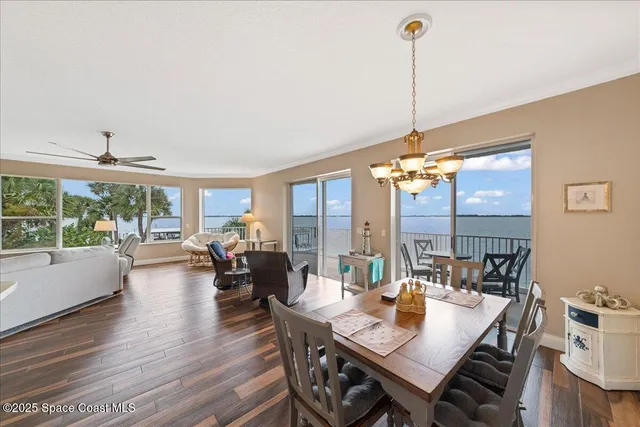 a spacious bathroom with a tub shower and sink