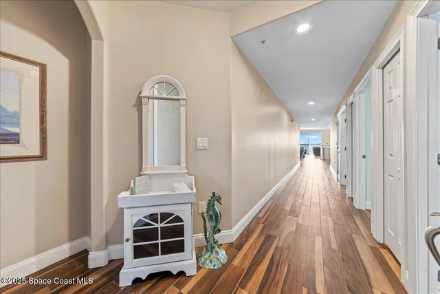 a kitchen with stainless steel appliances a stove a sink a microwave and cabinets