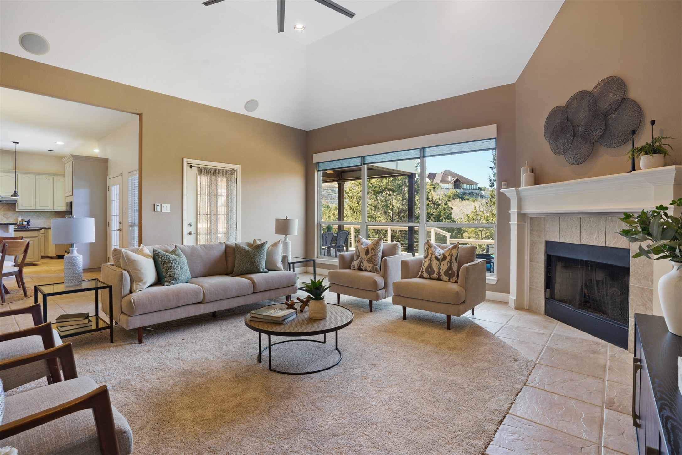 710 Timarron Leander, TX 78641 - Photo 10 of 22 Kitchen and dining open to the vaulted ceiling family room with remote shades