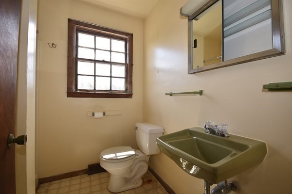 28 Harbor View Road Bourne, MA 02559 - Photo 11 of 14 a bathroom with a sink and a toilet