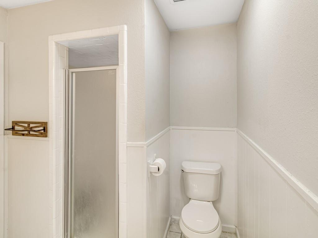 203 Hogg Street Streetman, TX 75859 - Photo 33 of 36 Carpeted bedroom featuring crown molding and an office area