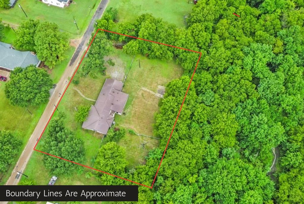 203 Hogg Street Streetman, TX 75859 - Photo 9 of 36 Aerial view of property's location featuring property boundaries highlighted