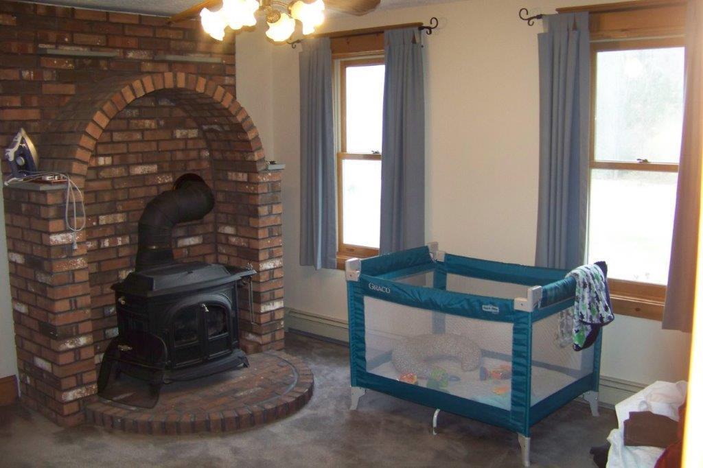 12 Wildwood Drive Springvale, ME 04083 - Photo 17 of 26 Den w/ brick hearth and wood stove