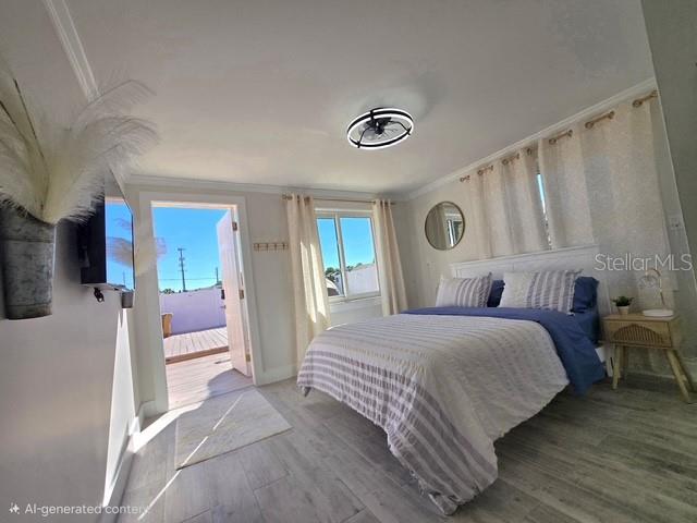 403 63rd Street Holmes Beach, FL 34217 - Photo 13 of 81 a bedroom with a bed and a view of bedroom