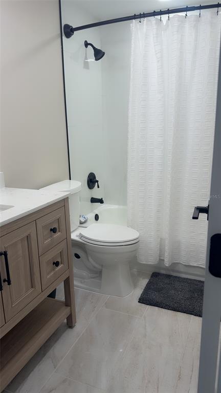 403 63rd Street Holmes Beach, FL 34217 - Photo 29 of 81 a bathroom with a sink and a mirror