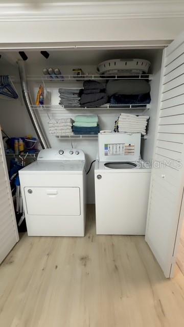 403 63rd Street Holmes Beach, FL 34217 - Photo 54 of 81 a utility room with dryer and washer