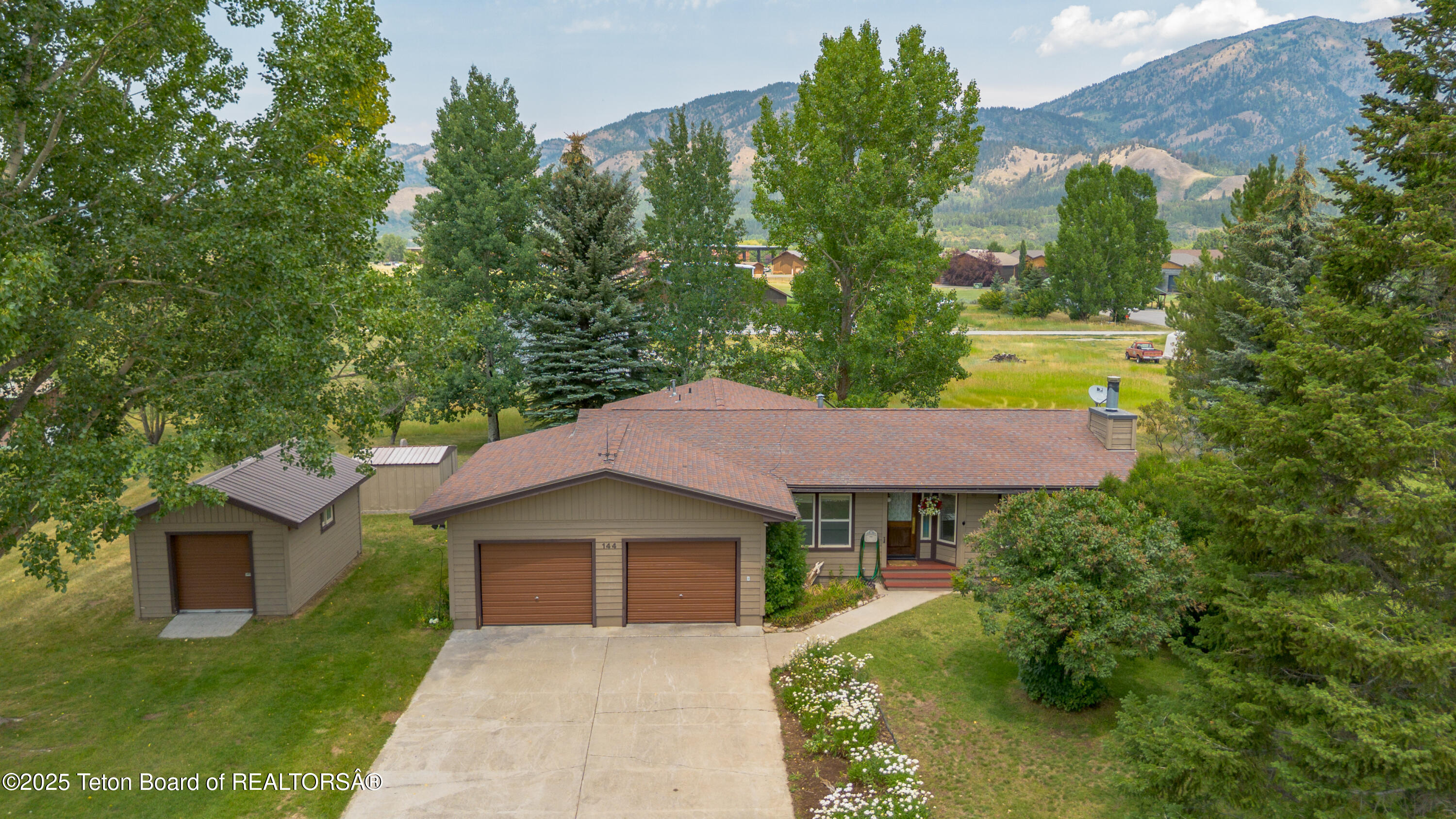 144 Blue Lake Circle Alpine, WY 83128 - Photo 1 of 1 144BlueLakeCirDrone_JGPhoto-6