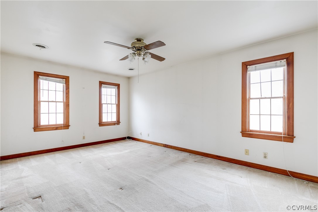11036 Rufford Road Chester, VA 23831 - Photo 17 of 35 a view of an empty room with a window