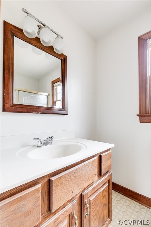 11036 Rufford Road Chester, VA 23831 - Photo 20 of 35 a bathroom with a sink and a mirror
