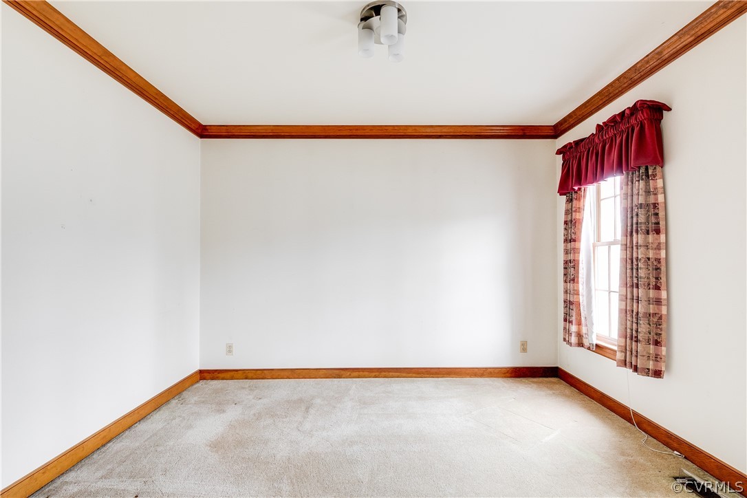11036 Rufford Road Chester, VA 23831 - Photo 3 of 35 a view of a room with a window and wooden floor