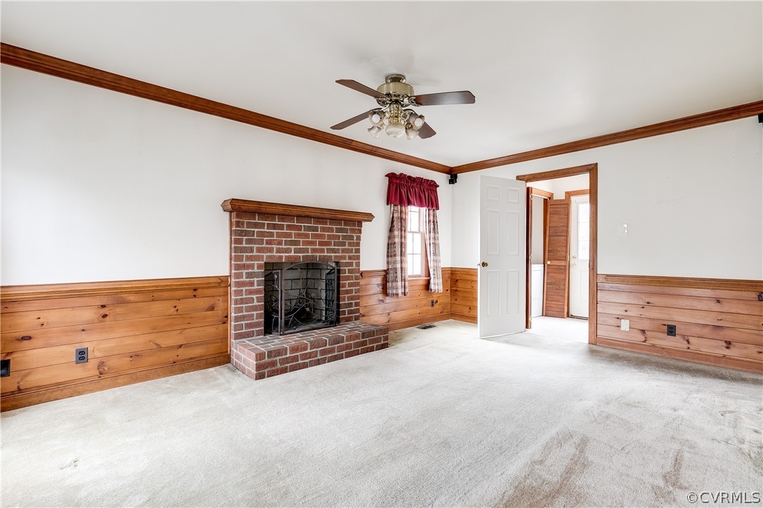 11036 Rufford Road Chester, VA 23831 - Photo 5 of 35 a view of an empty room with a fireplace