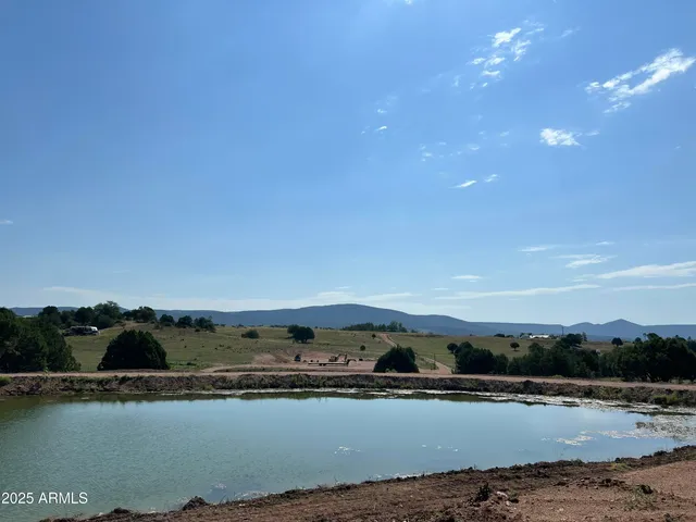 a view of a lake with a mountain